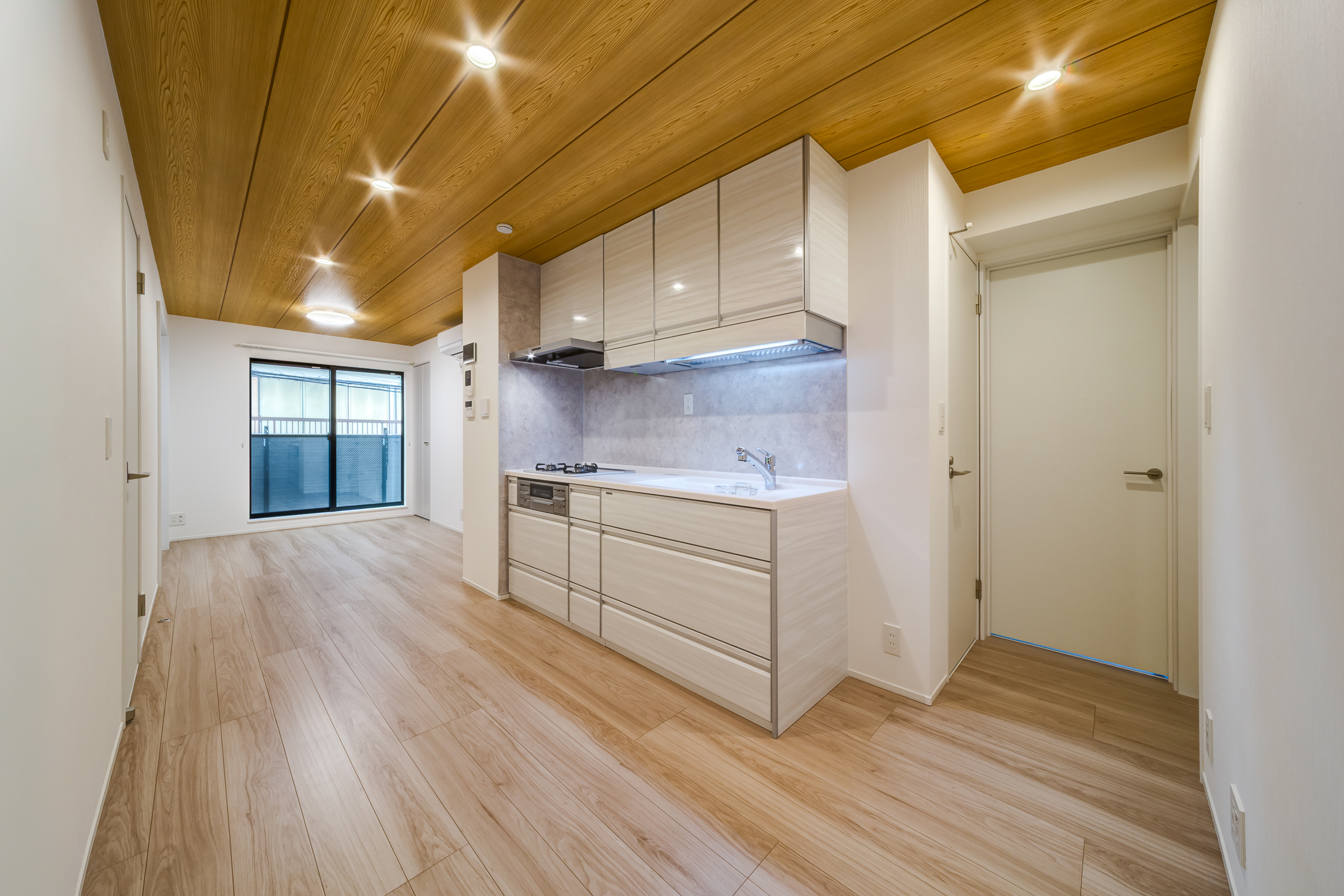 店舗、オーナールーム、賃貸が共存する三層の暮らし